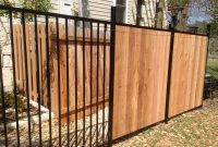 Custom Wrought Iron Fence Transitioning Into Privacy Cedar Fence for dimensions 3264 X 2448