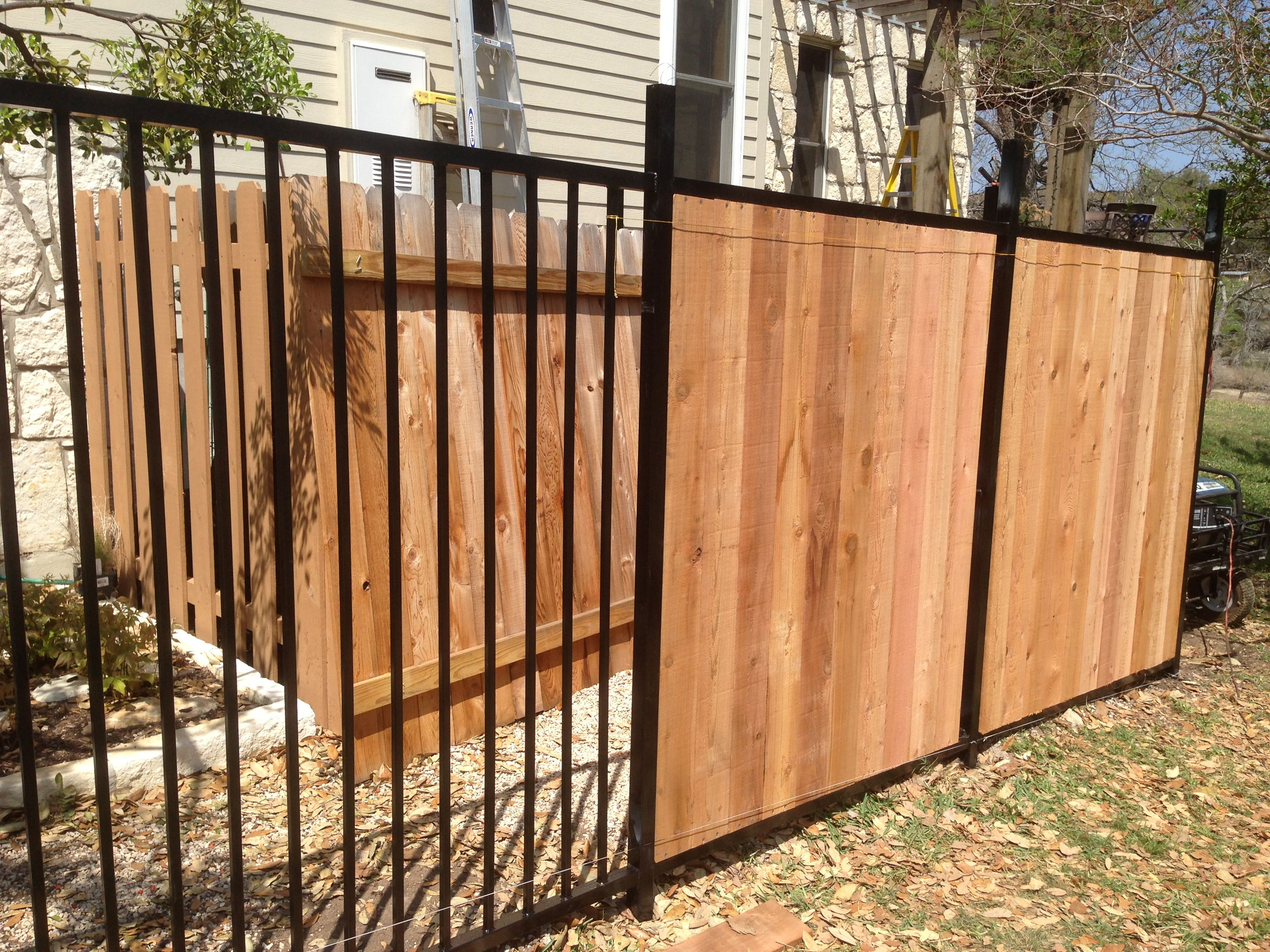 Custom Wrought Iron Fence Transitioning Into Privacy Cedar Fence for measurements 3264 X 2448