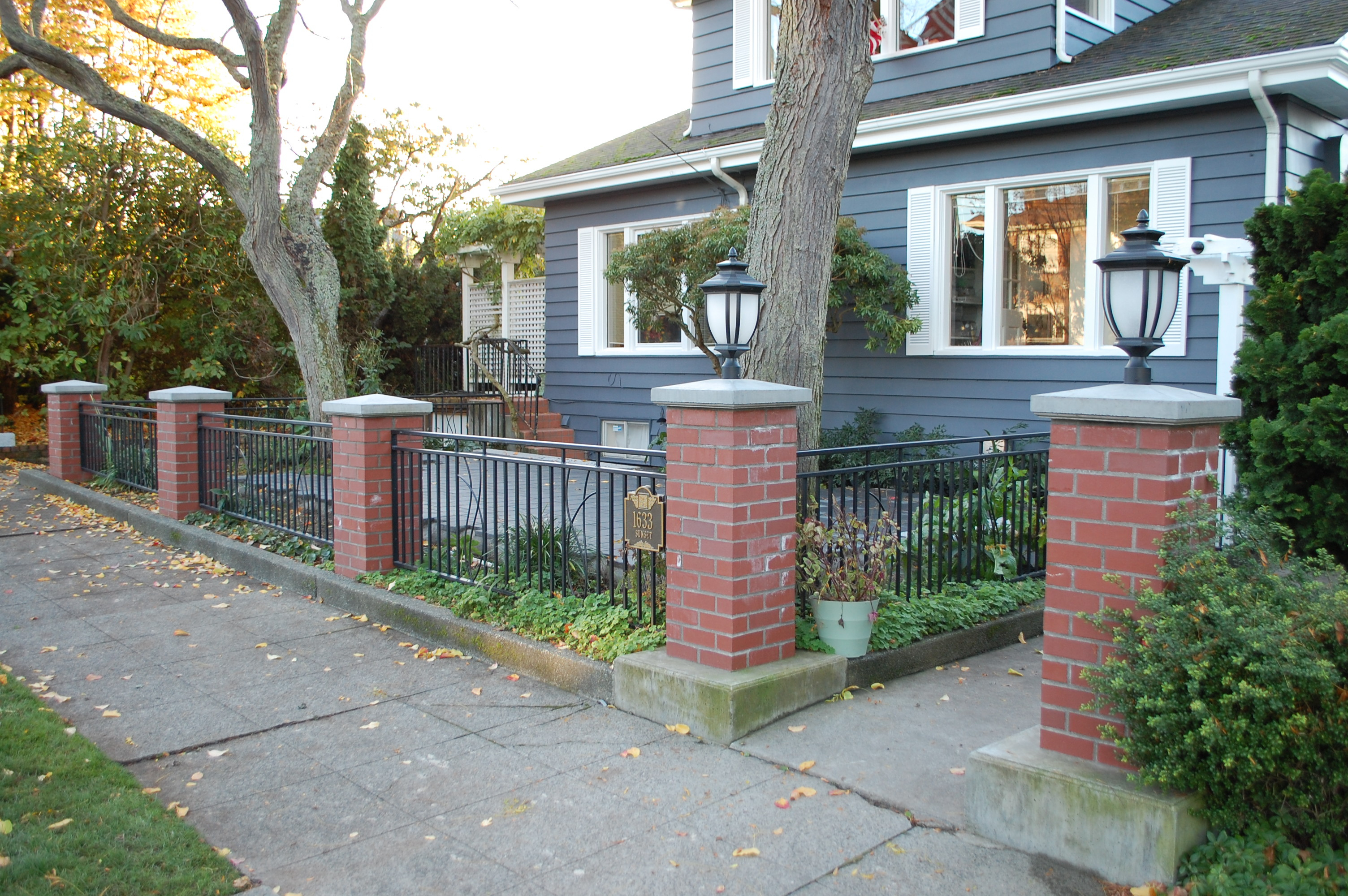 Red Brick And Wood Fence Fences Ideas with size 3008 X 2000