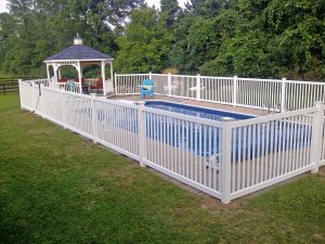 Vinyl Cayuga Yard Fence Installed Around An Inground Pool In Vernon in proportions 2560 X 1920