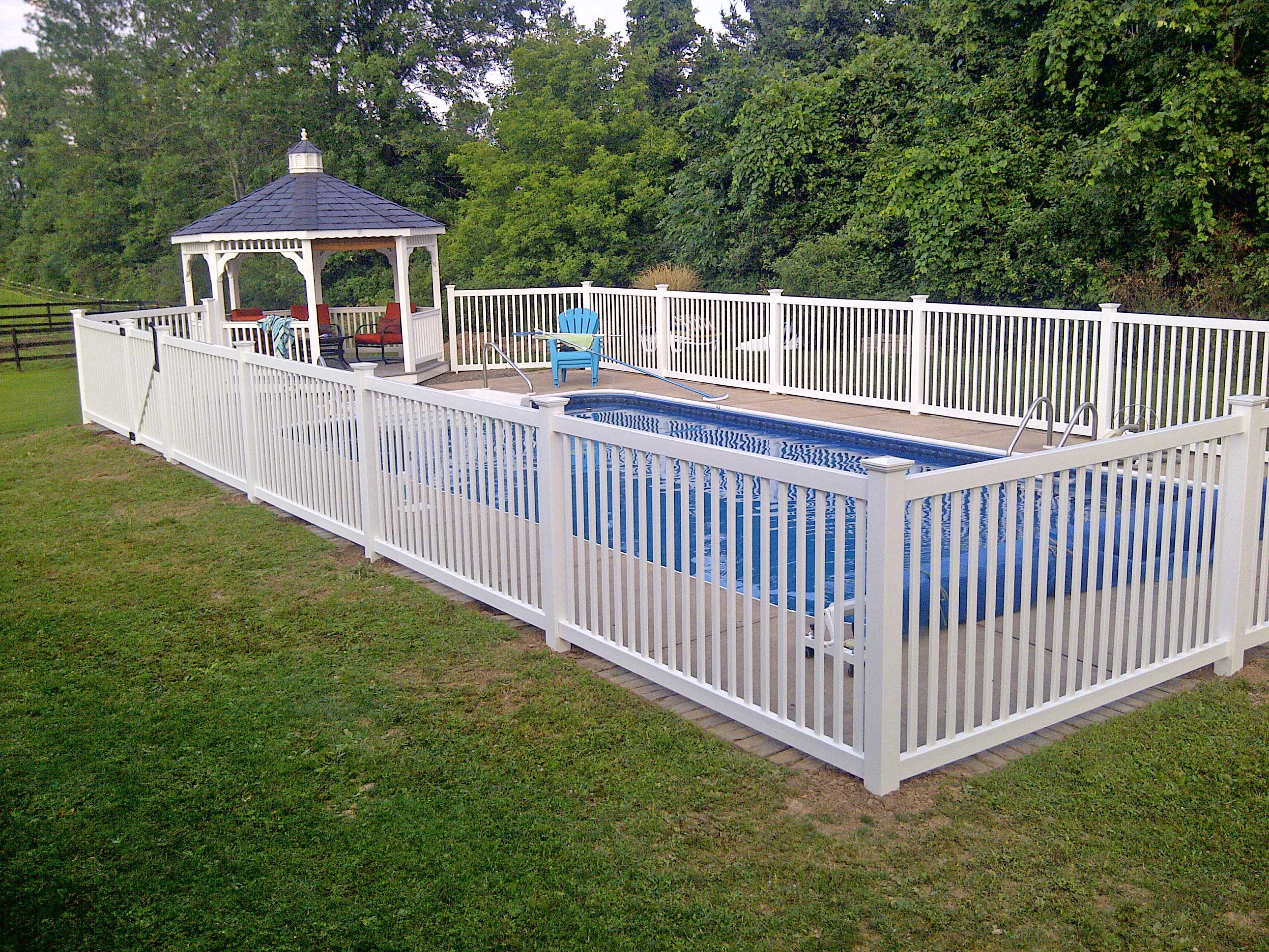 Vinyl Cayuga Yard Fence Installed Around An Inground Pool In Vernon in proportions 2560 X 1920