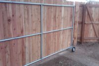 Wood Fence Ideas With A Gate Steel Framed Roll Gate With Wood in measurements 2048 X 1536