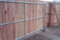 Wood Fence Ideas With A Gate Steel Framed Roll Gate With Wood regarding sizing 2048 X 1536