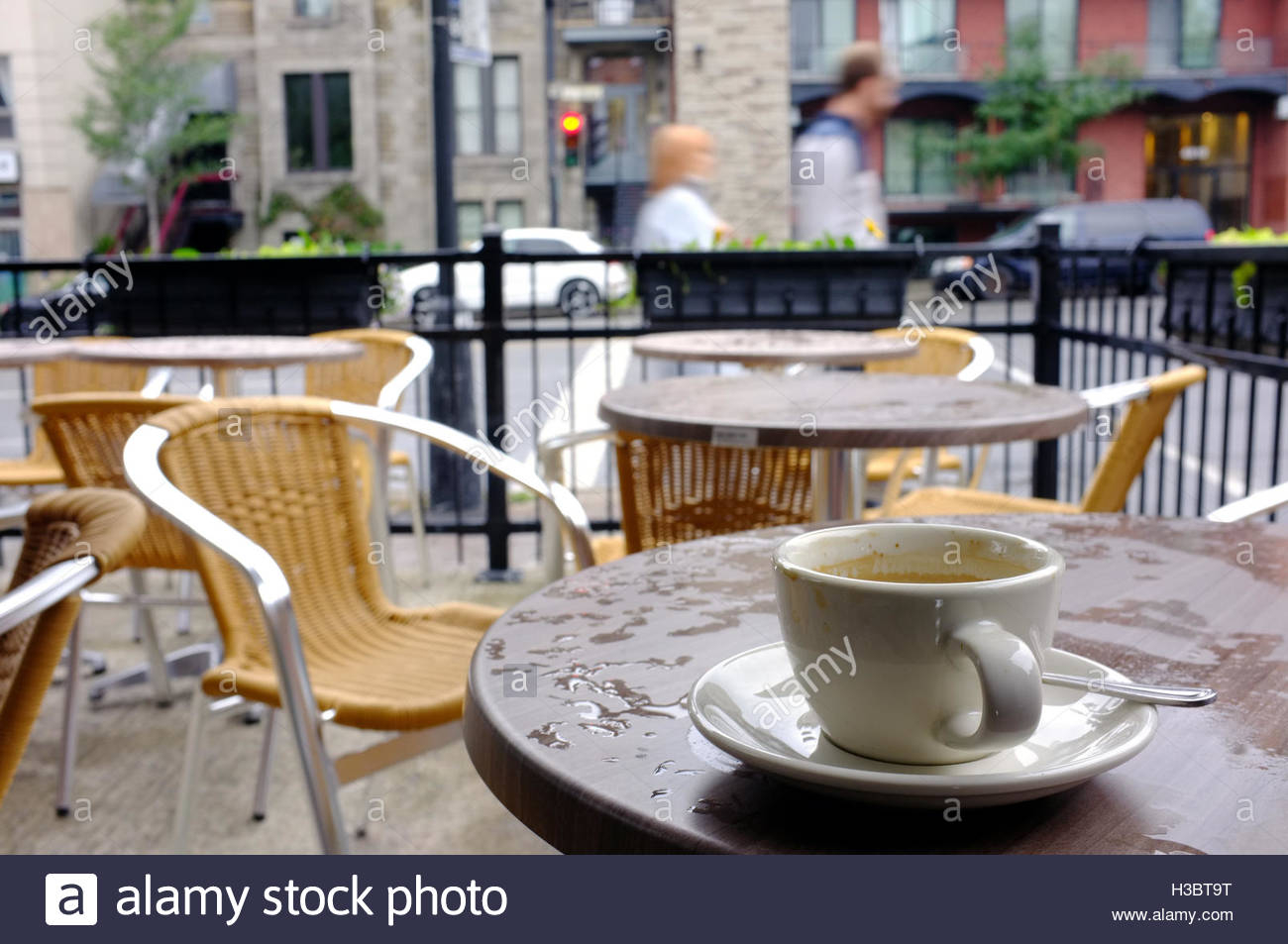 An Empty Coffee Cup On A Table Outside A Cafe In Montreal within sizing 1300 X 953
