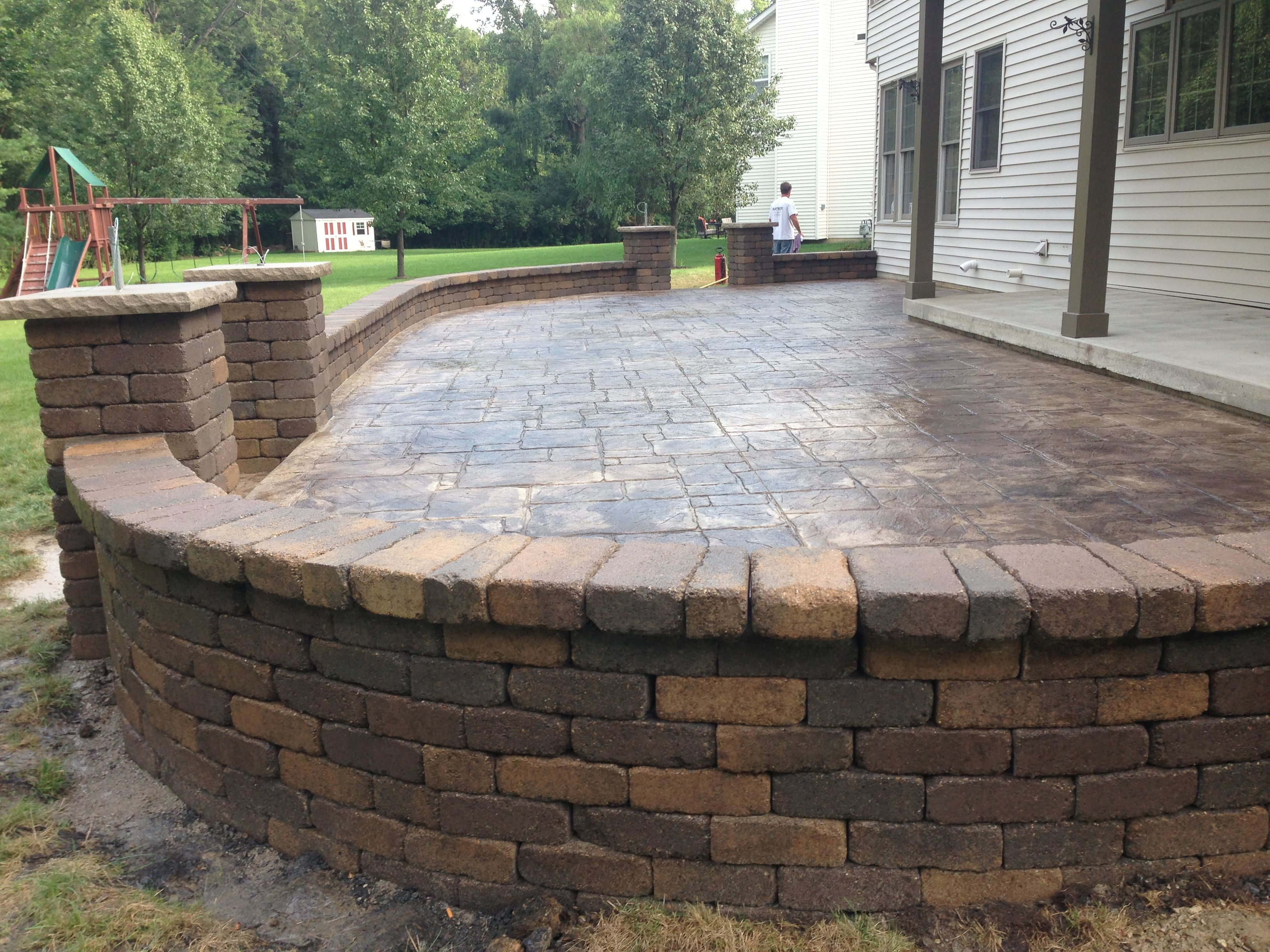 Decorative Stamped Concrete Patio With Retaining Wall And inside sizing 3264 X 2448