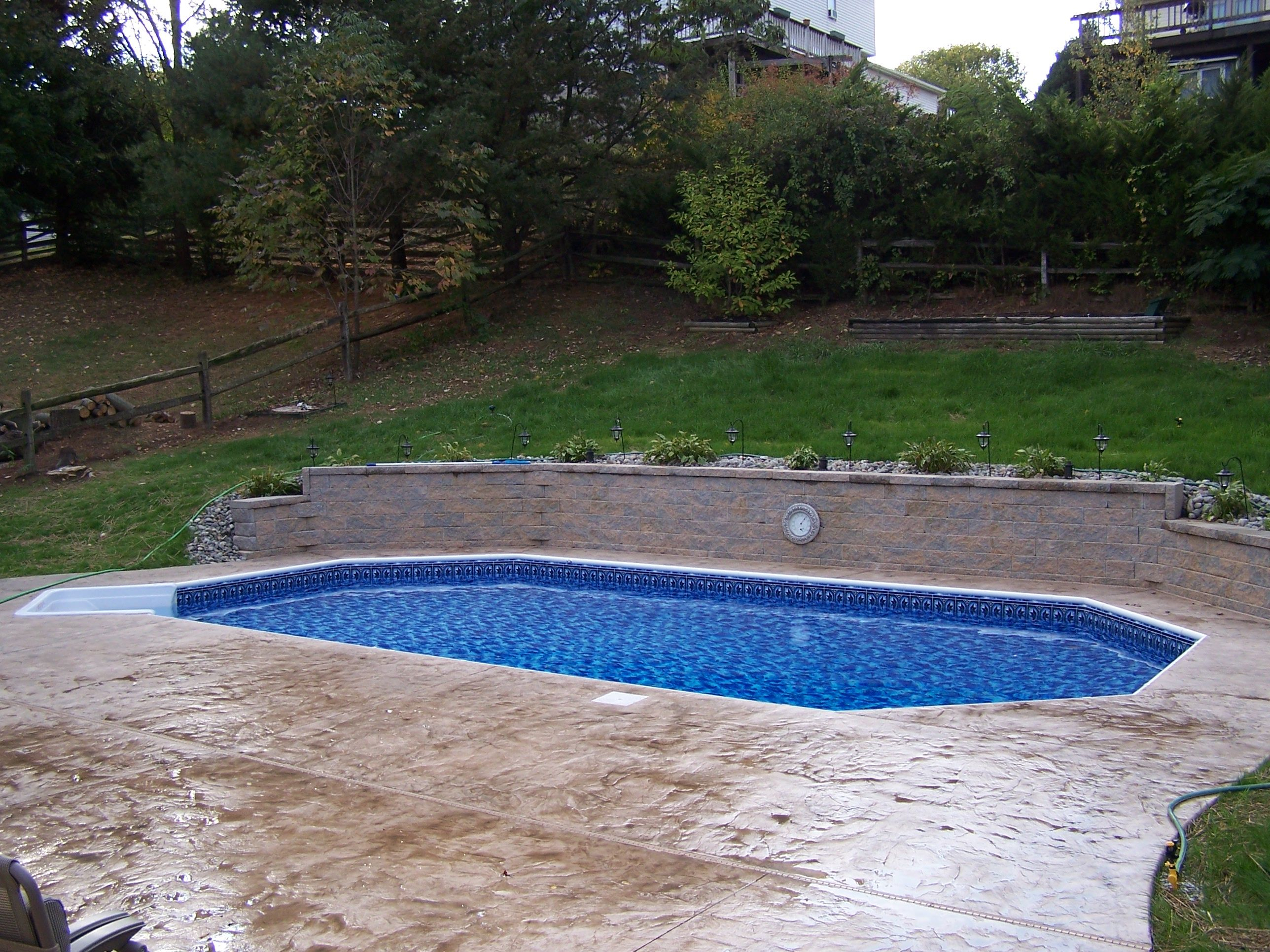 Grecian With Stamped Concrete Patio And Retaining Wall inside measurements 2576 X 1932