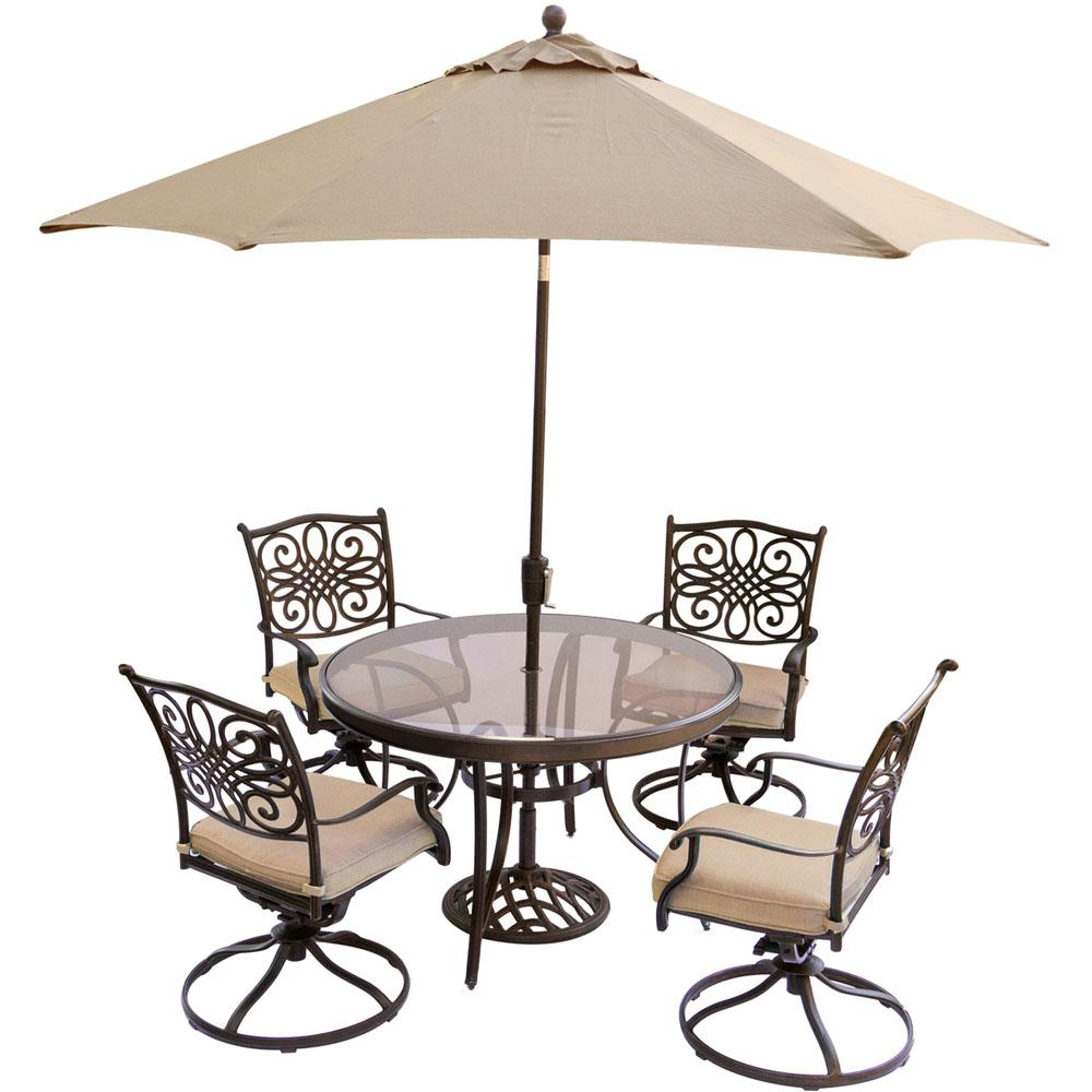 Hanover 5 Piece Outdoor Dining Set With Round Glass Table Swivel Chairs Umbrella And Base With Natural Oat Cushions pertaining to dimensions 1000 X 1000