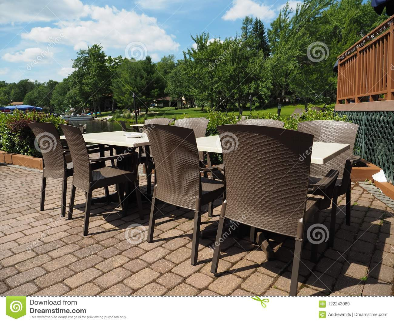 Lakeside Outdoor Patio Tables And Chairs Stock Image Image intended for proportions 1300 X 1065