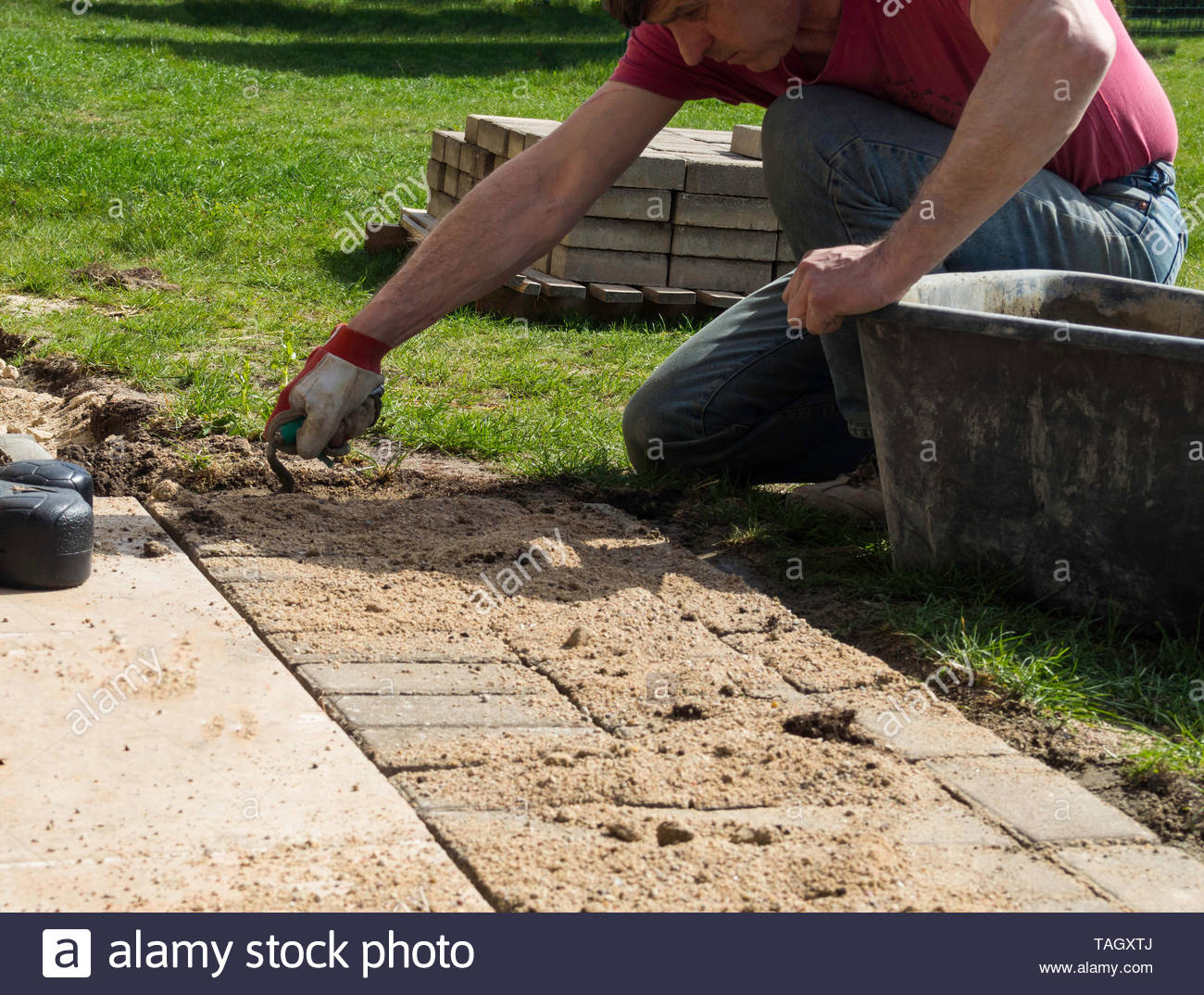 Laying Gray Concrete Paving Slabs In House Courtyard with dimensions 1300 X 1074