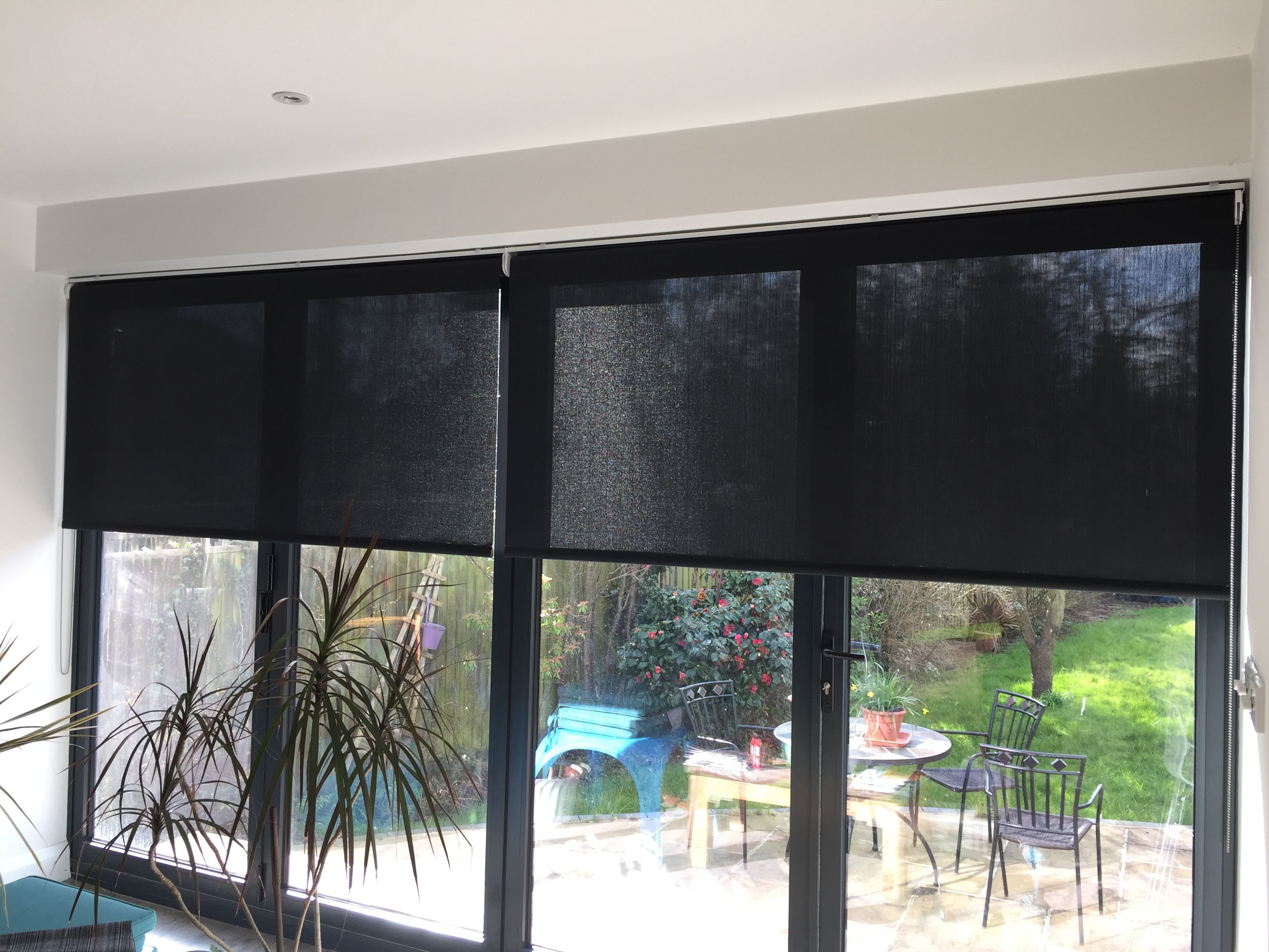 Roller Blinds In Sunscreen Fabric On Bifold Doors Blinds inside proportions 3264 X 2448