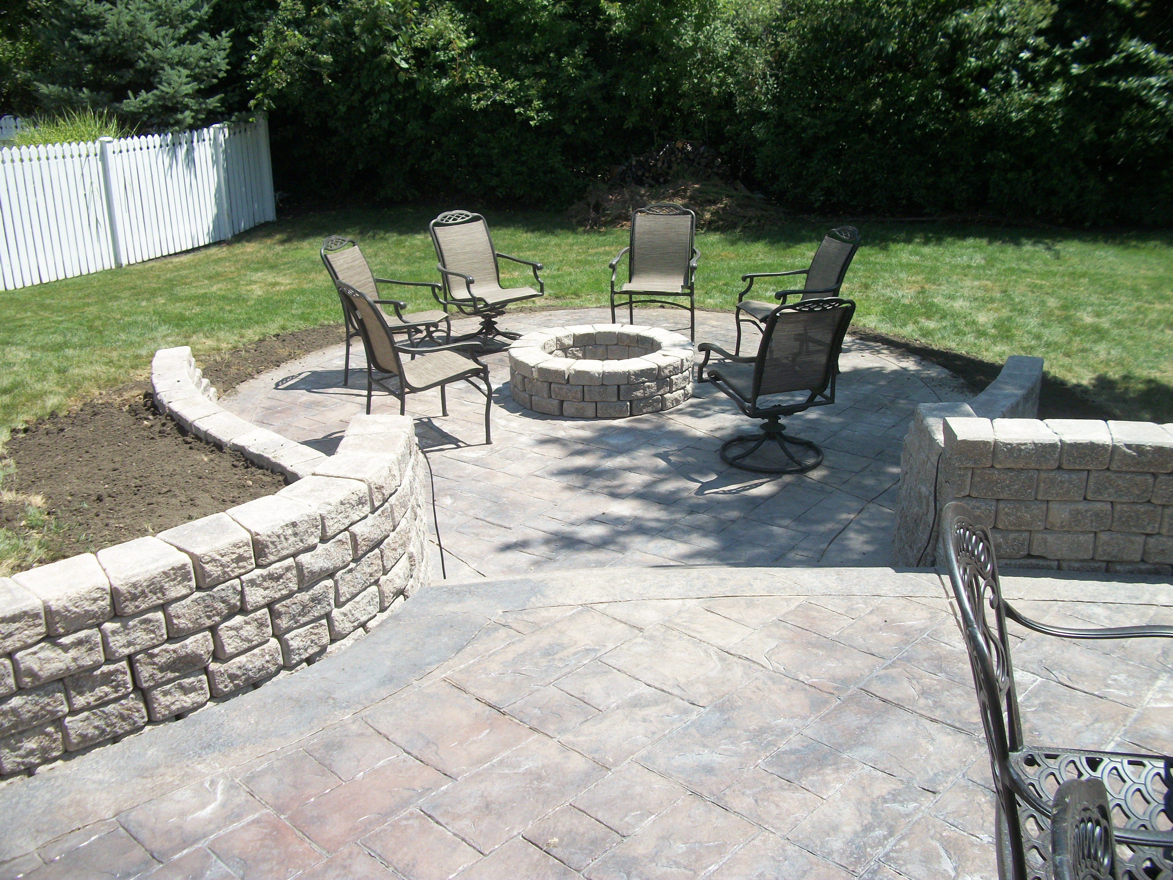 Stamped Concrete Patio With Retaining Walls And Fire Pit In for proportions 4000 X 3000