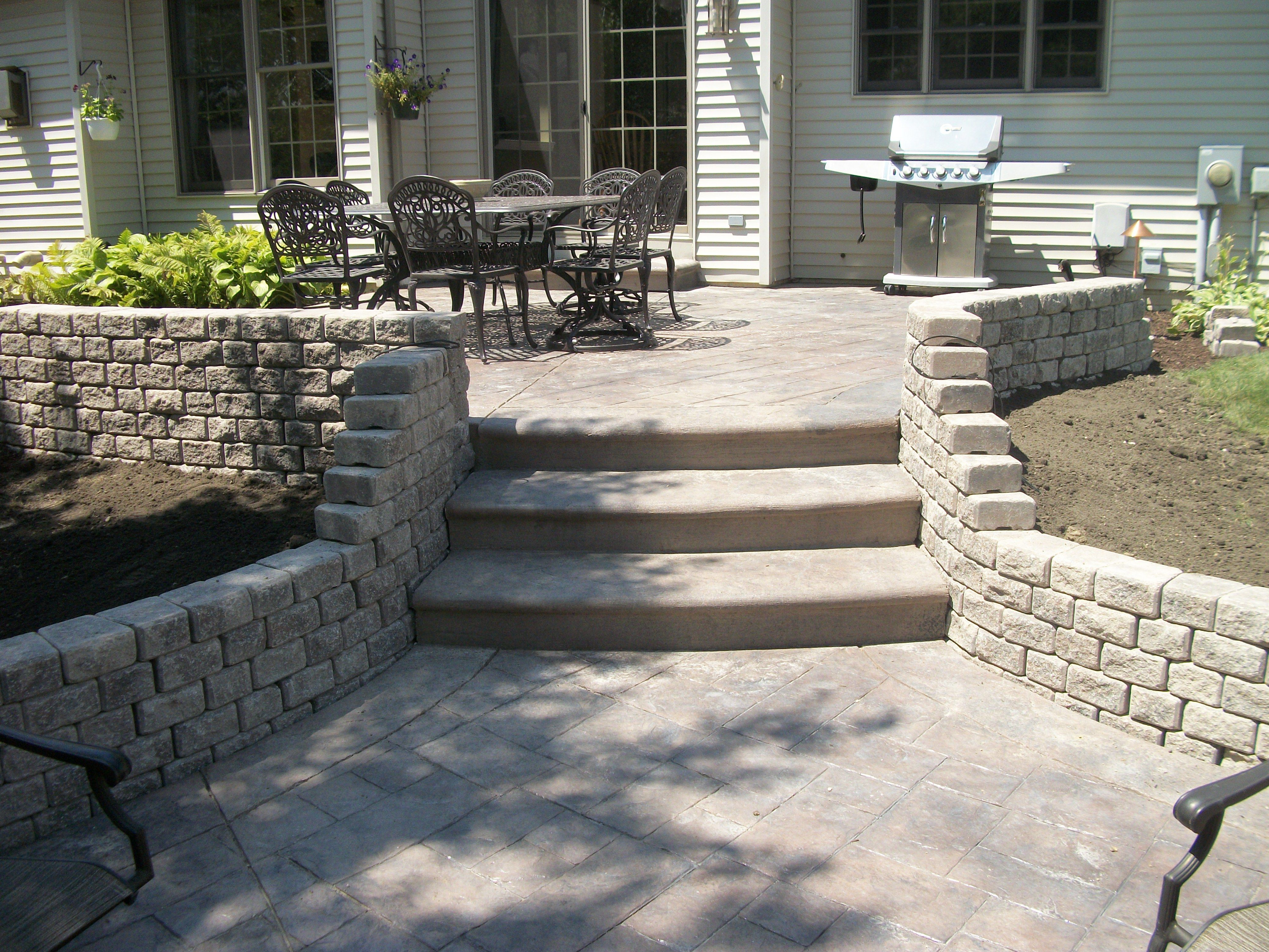 Stamped Concrete Patio With Steps And Retaining Wall inside measurements 4000 X 3000